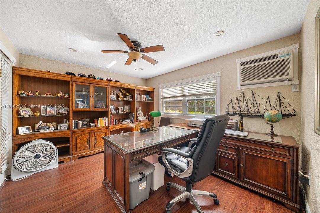 Open permit for addition of two walls; construction complete. Buyer to verify structural integrity and approvals.