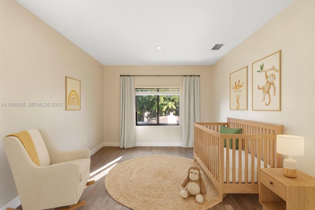 3rd Bedroom. Spacious second-floor bedroom featuring an en suite bathroom and a walk-in closet.