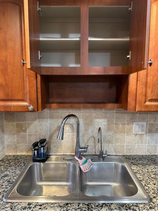 Cabinet above the sink