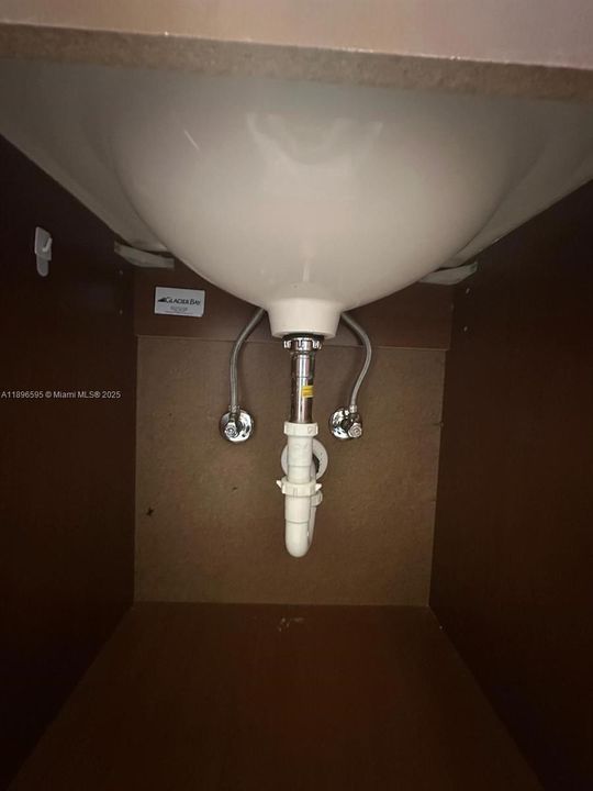 under the sink of the 2nd bathroom