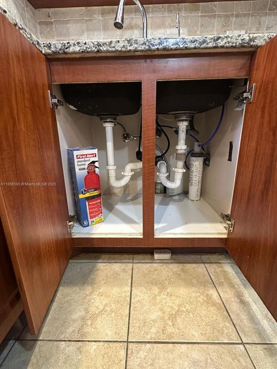 Under the kitchen sink