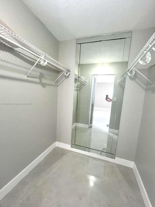 BIG WALK IN CLOSET IN MASTER BEDROOM