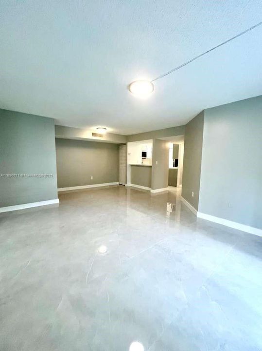 HUGE LIVING AREA W/BRAND NEW FLOORS