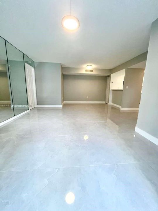 HUGE LIVING AREA W/BRAND NEW FLOORS