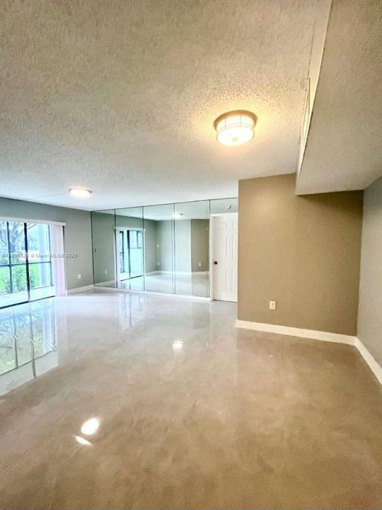 HUGE LIVING AREA W/BRAND NEW FLOORS