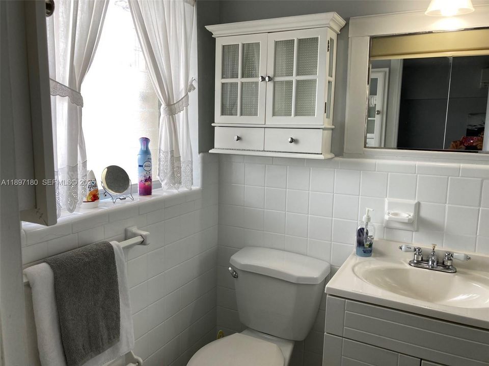 Bathroom in bedroom with window
