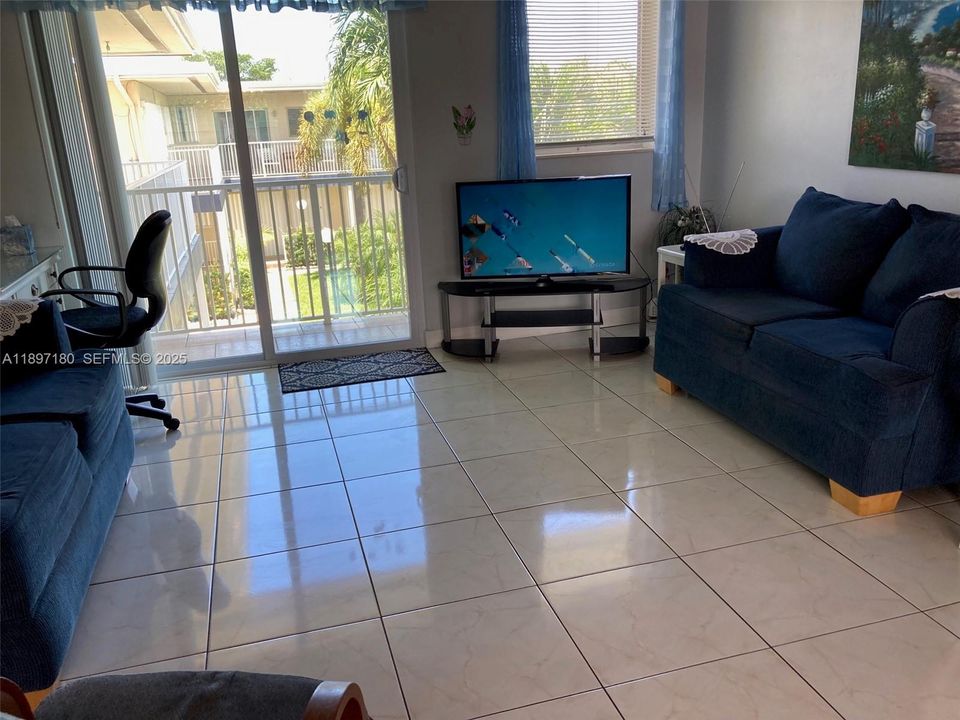 Newer Patio Door to large open balcony