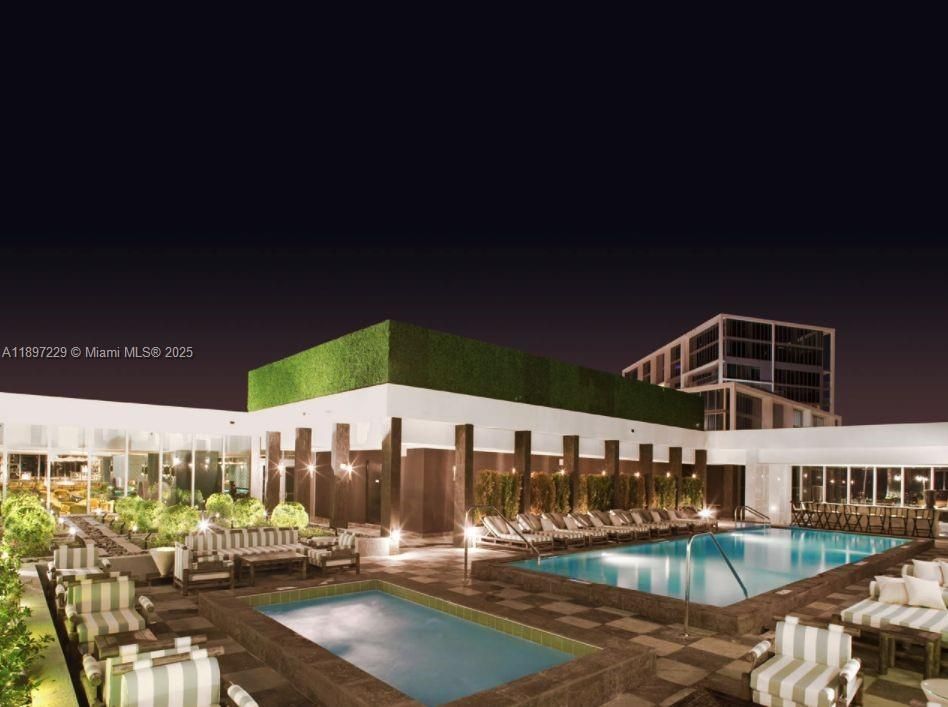 GORGEOUS POOL DECK WITH 3 POOLS, CABANA, RESORT STYLE WITH GUESTS OF THE W, SO IT'S ALWAYS A COOL VIBE!