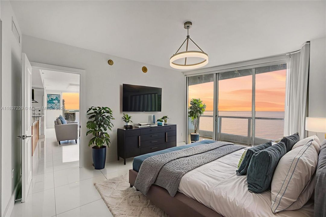 PRIMARY WITH SUNRISE VIEWS FROM YOUR BED!