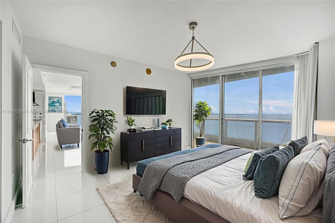 PRIMARY WITH SUNRISE VIEWS FROM YOUR BED!