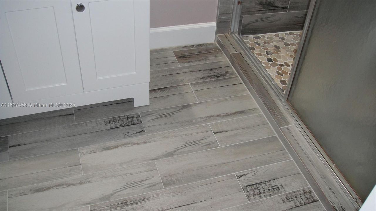 PRIMARY BATH BEAUTIFUL TILE FLOORING