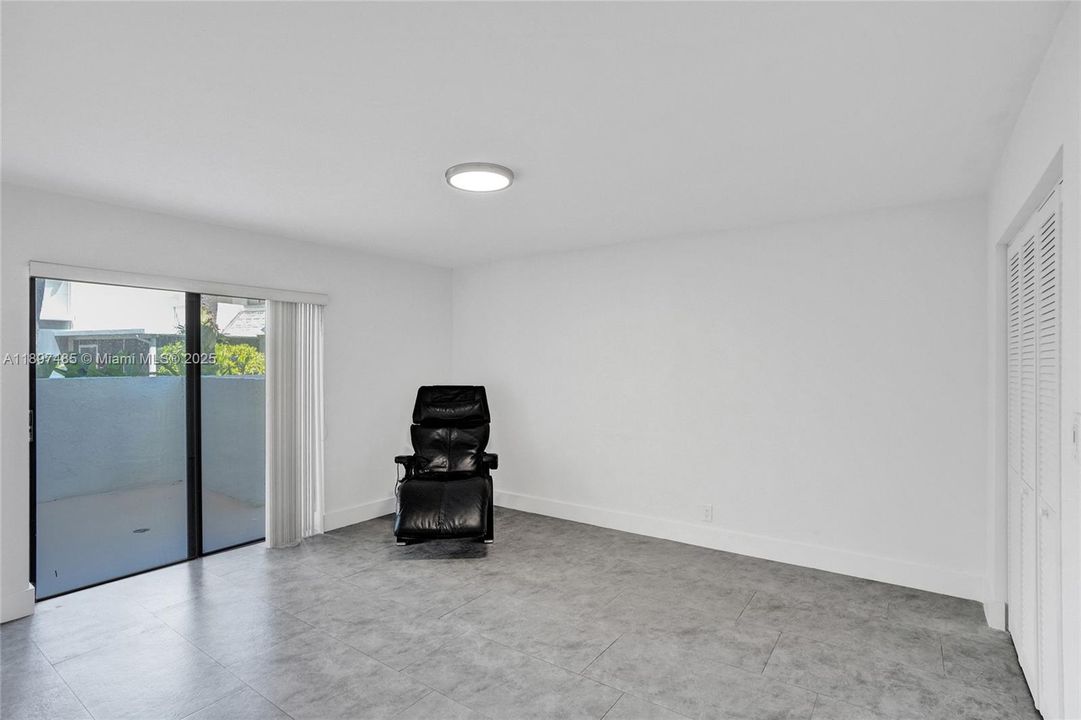 Primary bedroom overlooking the private entry