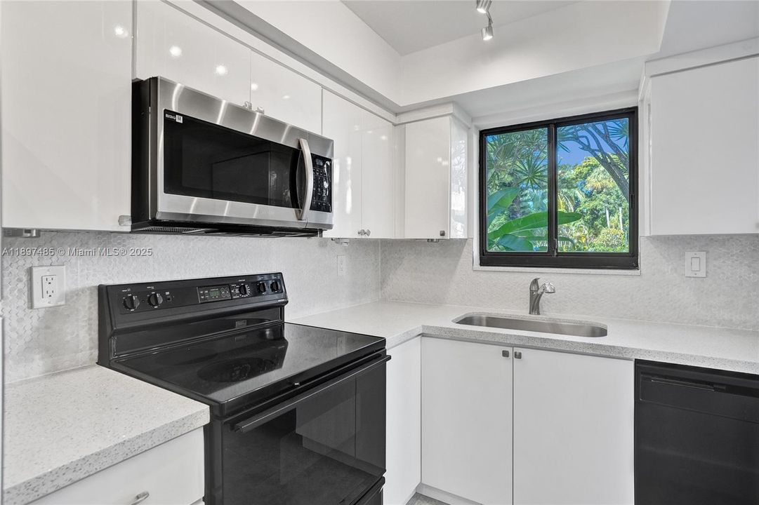 Lots of natural light...quartz counter tops