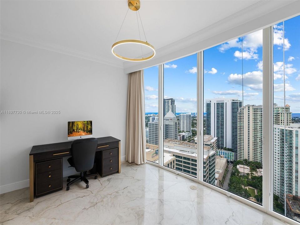 3rd bedroom or office with ocean and city skyline views