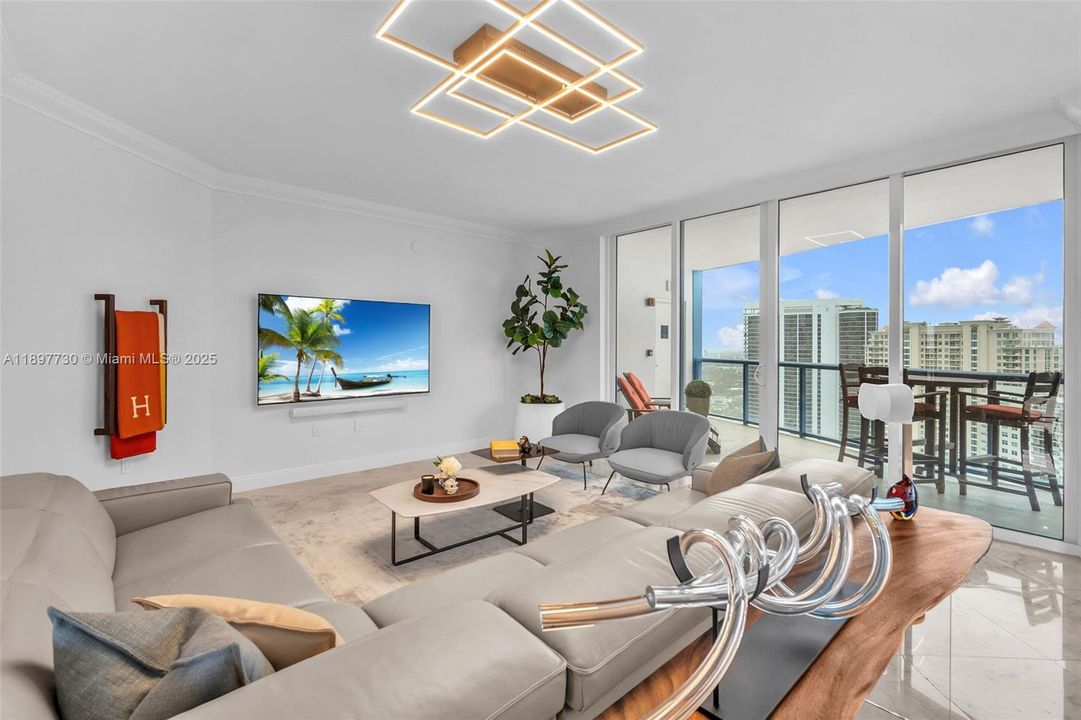 Living room with large balcony + ocean views