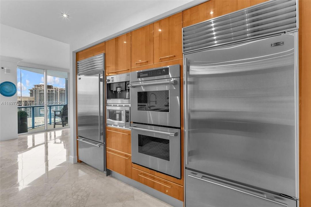 2 Sub Zero refrigerators