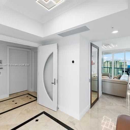 Private elevator foyer with double door entry