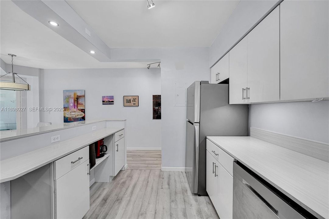 large slab porcelain countertops, french oak washed wood flooring