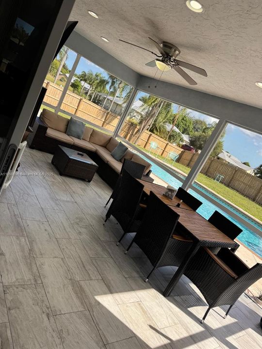 Sun Room Screened w/ Pool view