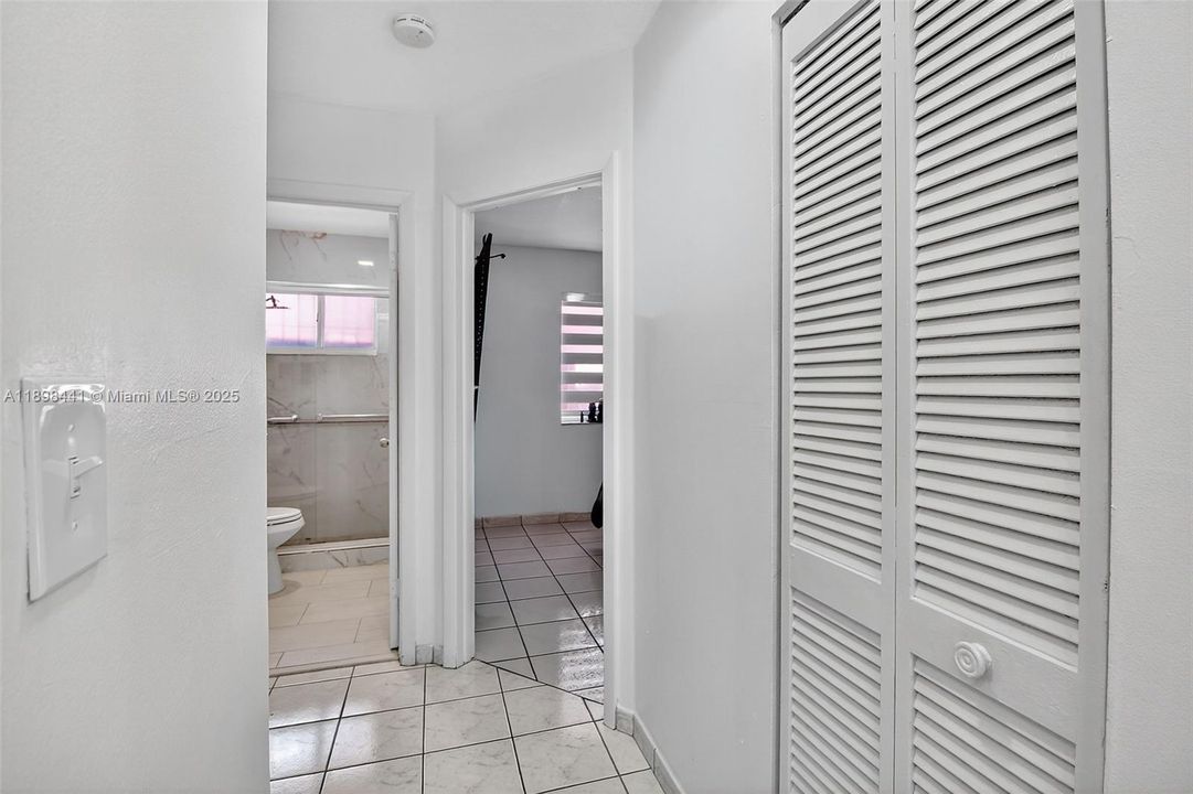 Hallway to bedroom and bathroom