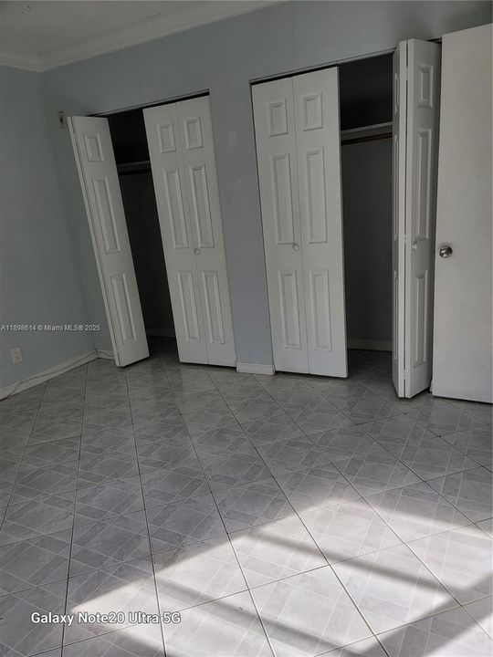 WALL TO WALL CLOSET IN THE BEDROOM