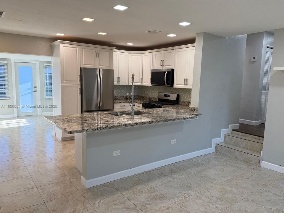 Open concept living and kitchen