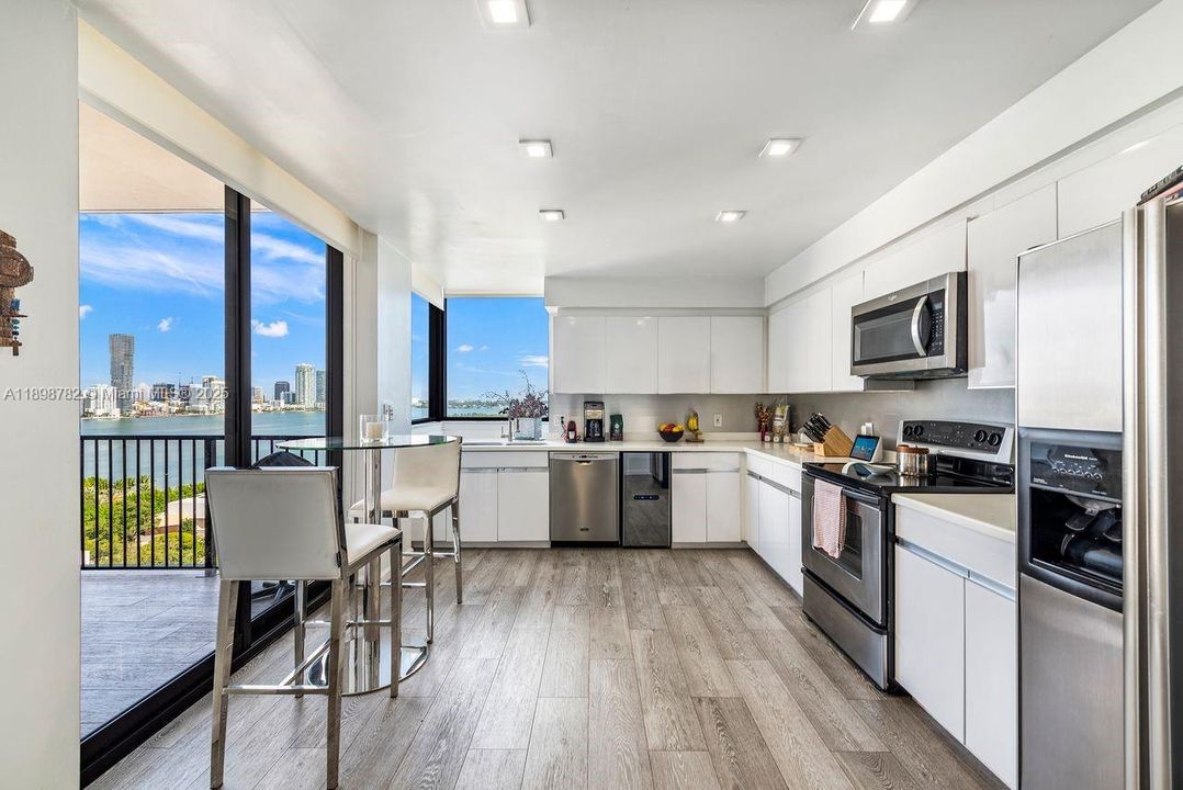 Updated cabinets, flooring & appliances