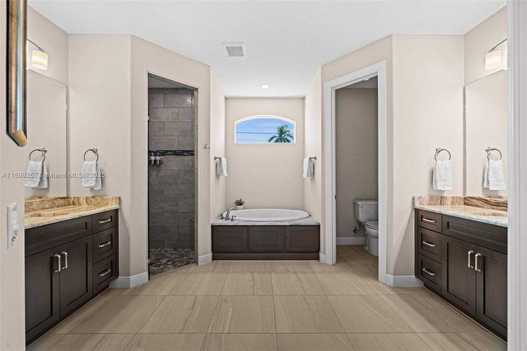 Master bath with separate tub and shower