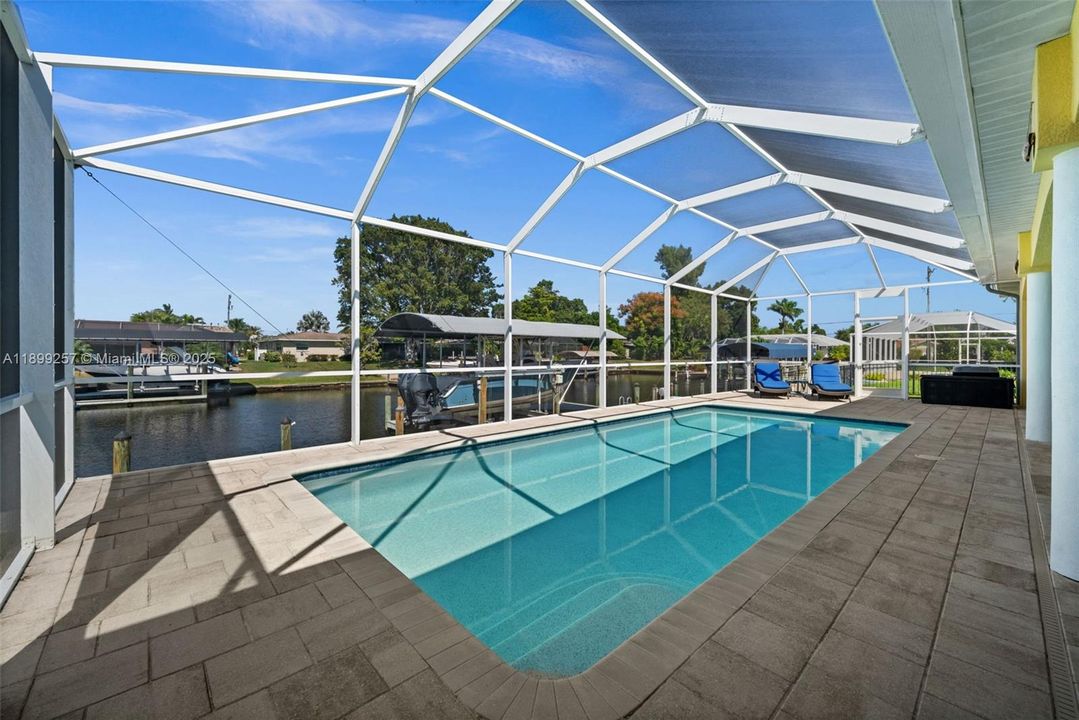 Have a swim in the screened pool area