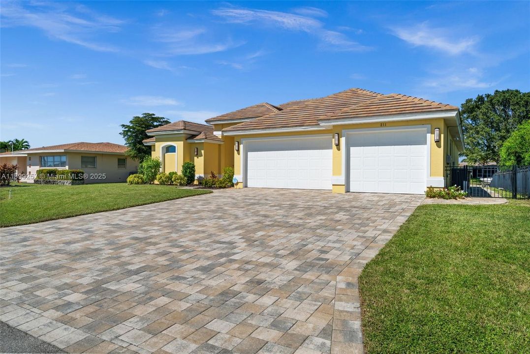 Beautiful Paver Driveway and 3 car garage