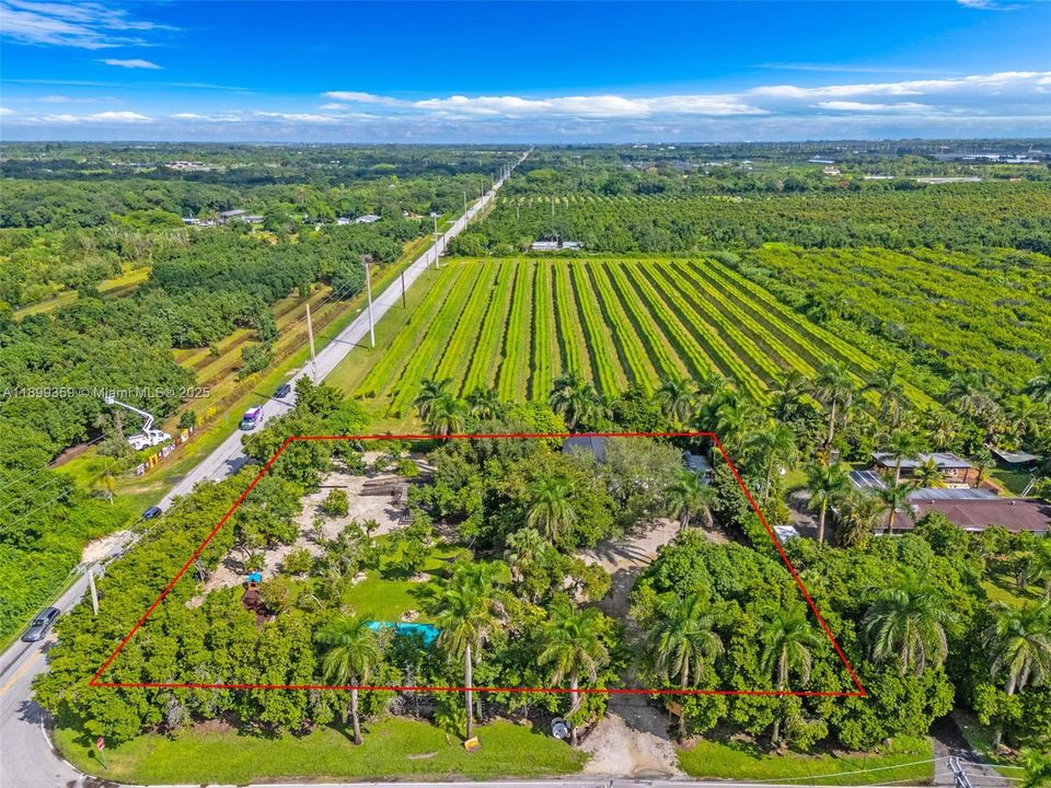 CORNER AERIAL VIEW OF 1+ ACRE ENTRANCES ON SW 232 ST & SW 147 AVE
