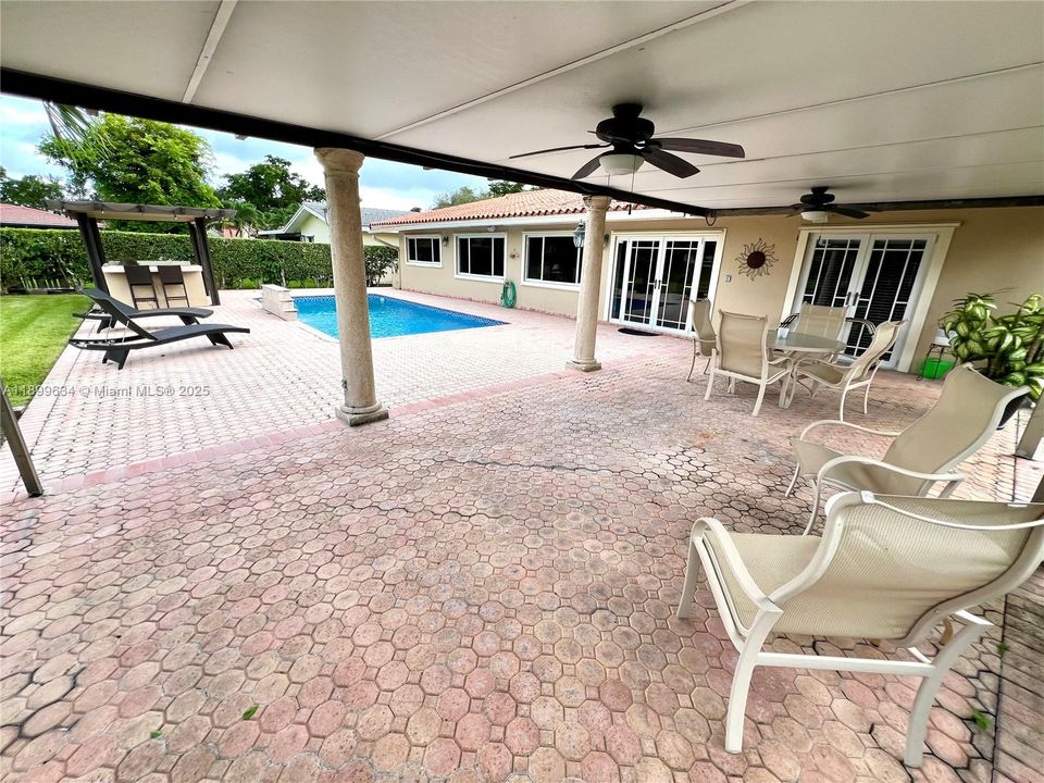 Pool, covered patio and covered barbecue area