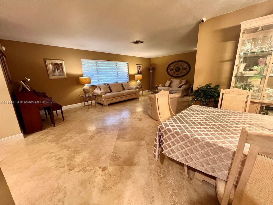 View and access to living room and formal dining room from the kitchen
