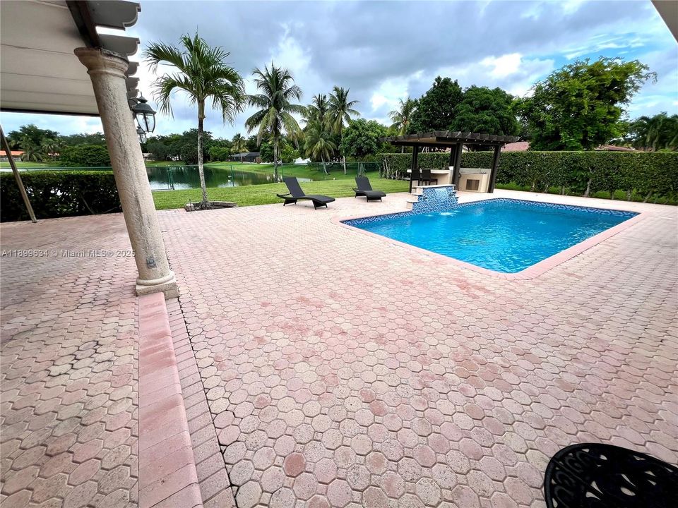 Pool, covered patio and covered barbecue area