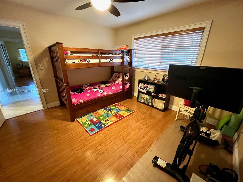 Bedroom #1 has a large walk-in closet and ceiling fan