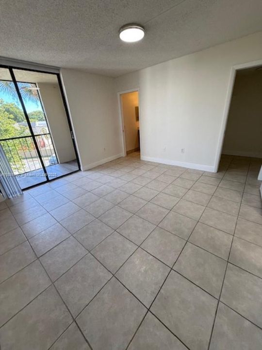 master bedroom with sliding door to balcony