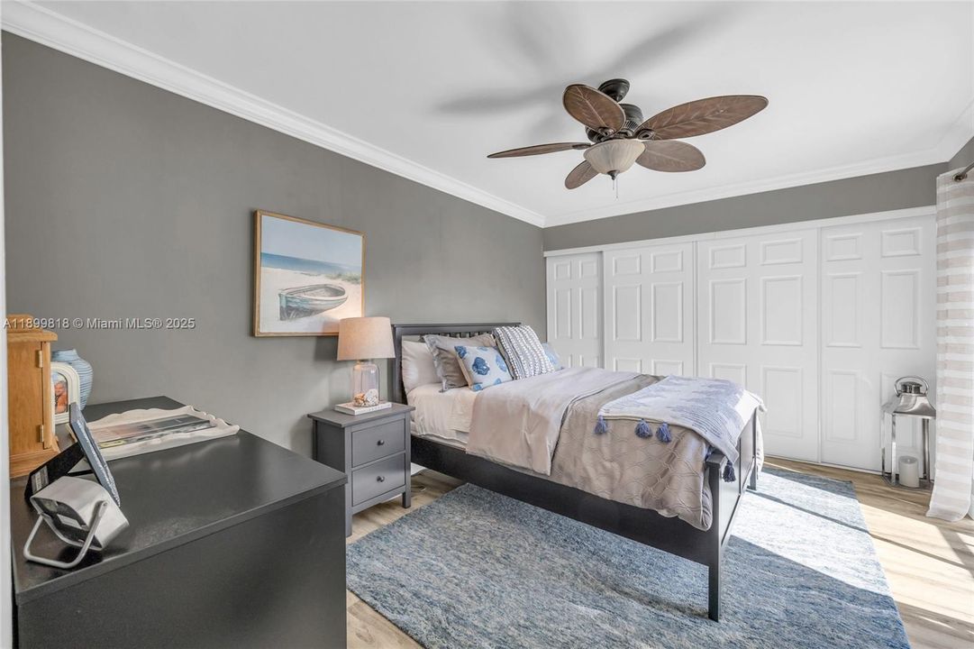 Guest bedroom with custom closet system