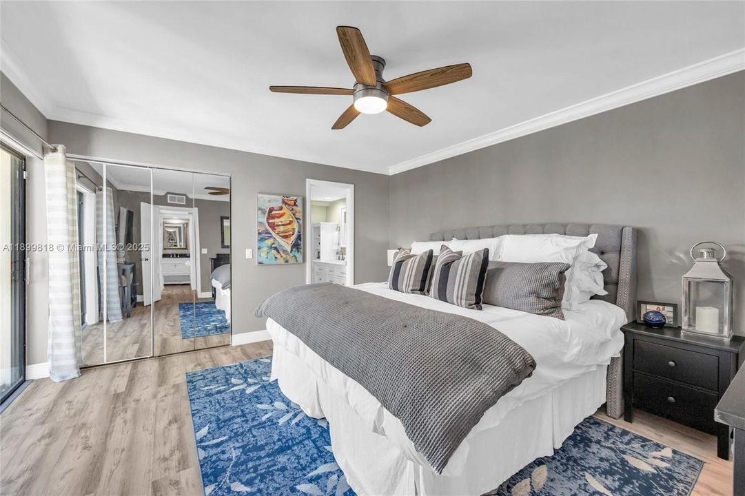 Primary bedroom suite with custom closet