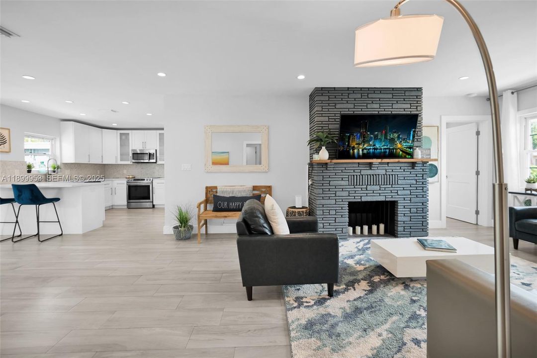 Elegant living room with a cozy ambiance and stylish decor, ideal for gatherings or unwinding after a long day.