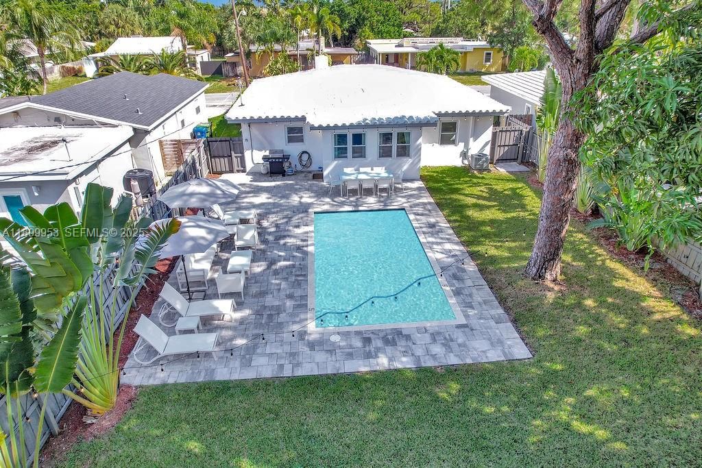 Outdoor lounge area designed for entertaining, with plenty of space for dining, sunbathing, or evening gatherings under the stars.