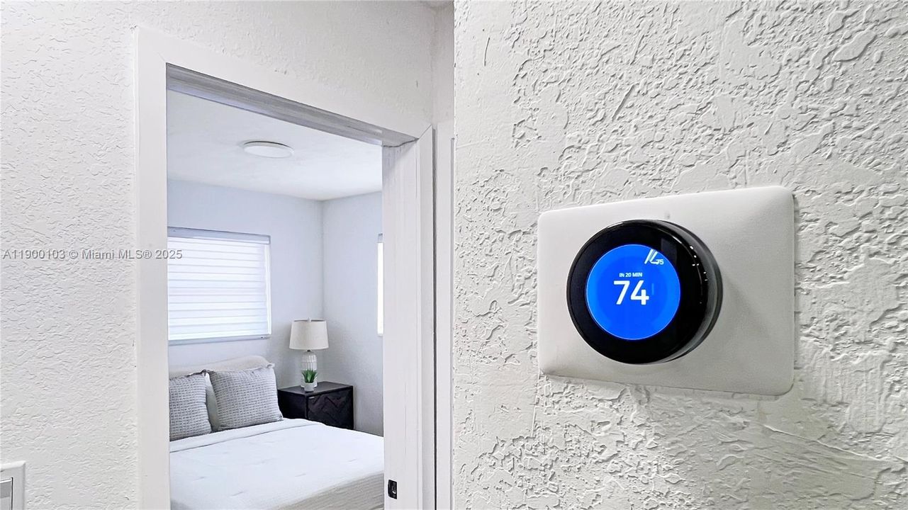 Google Nest A/C Thermostat.