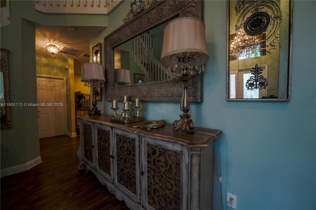 Between living room and kitchen