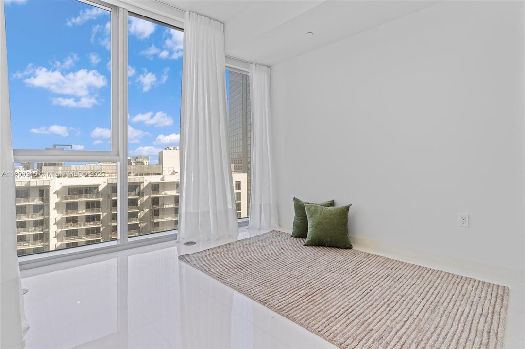 Secondary Bedroom has a queen bed.