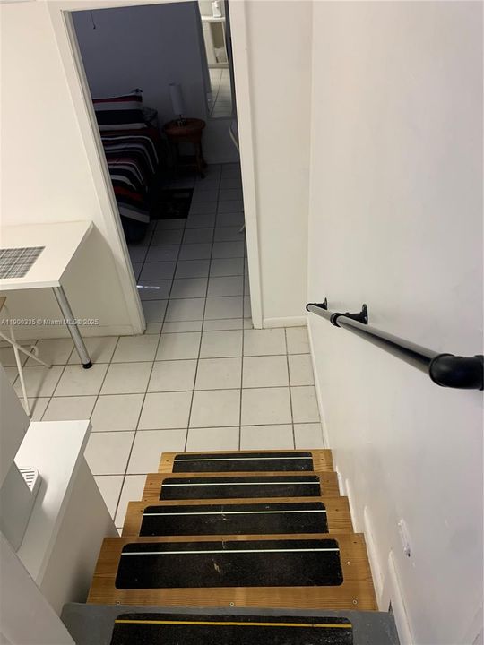 Steps down to Bedroom/Kitchenette