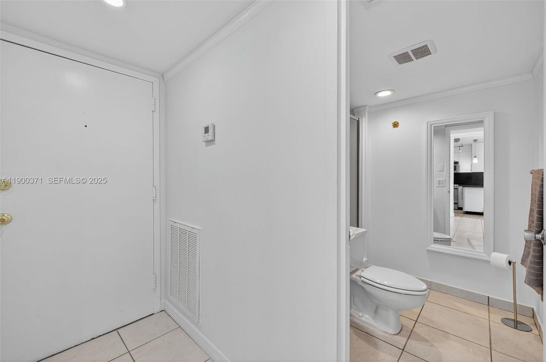 Guest Bathroom w/ stall shower and pedestal sink