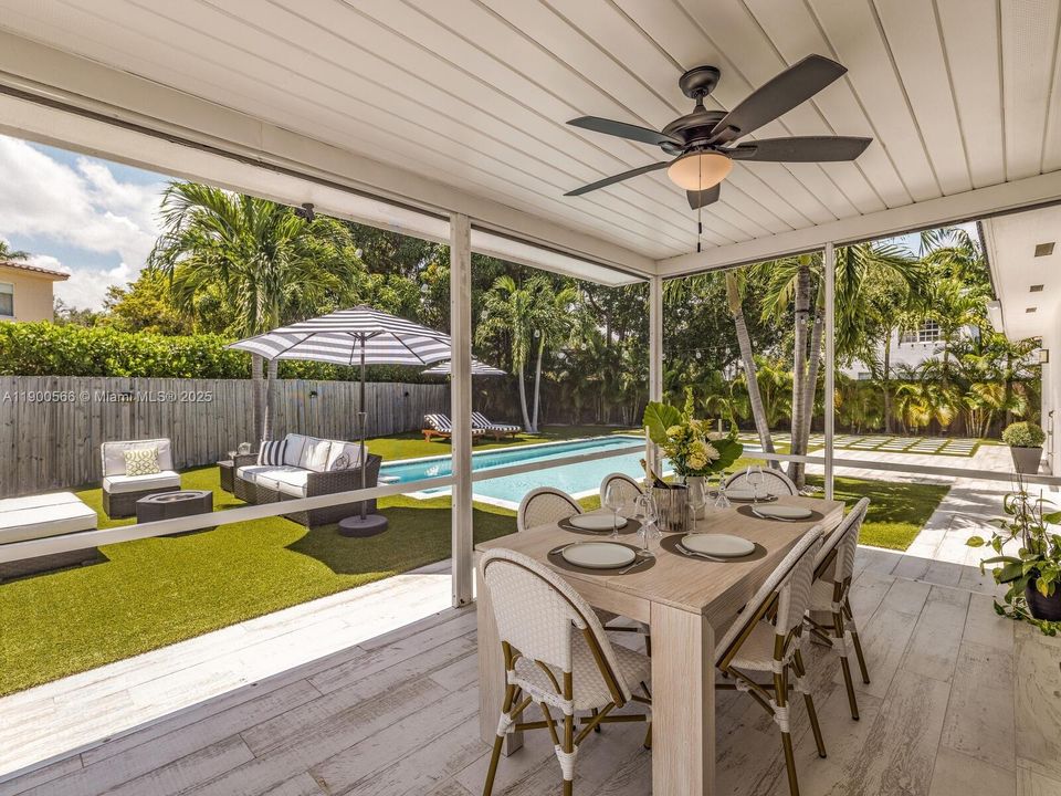 Screened-in Patio with Pool & Garden Oasis