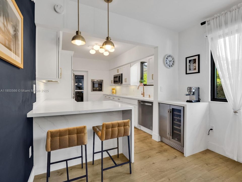 Remodeled Open Kitchen with New Premium Appliances, Breakfast Bar & Wine Bar