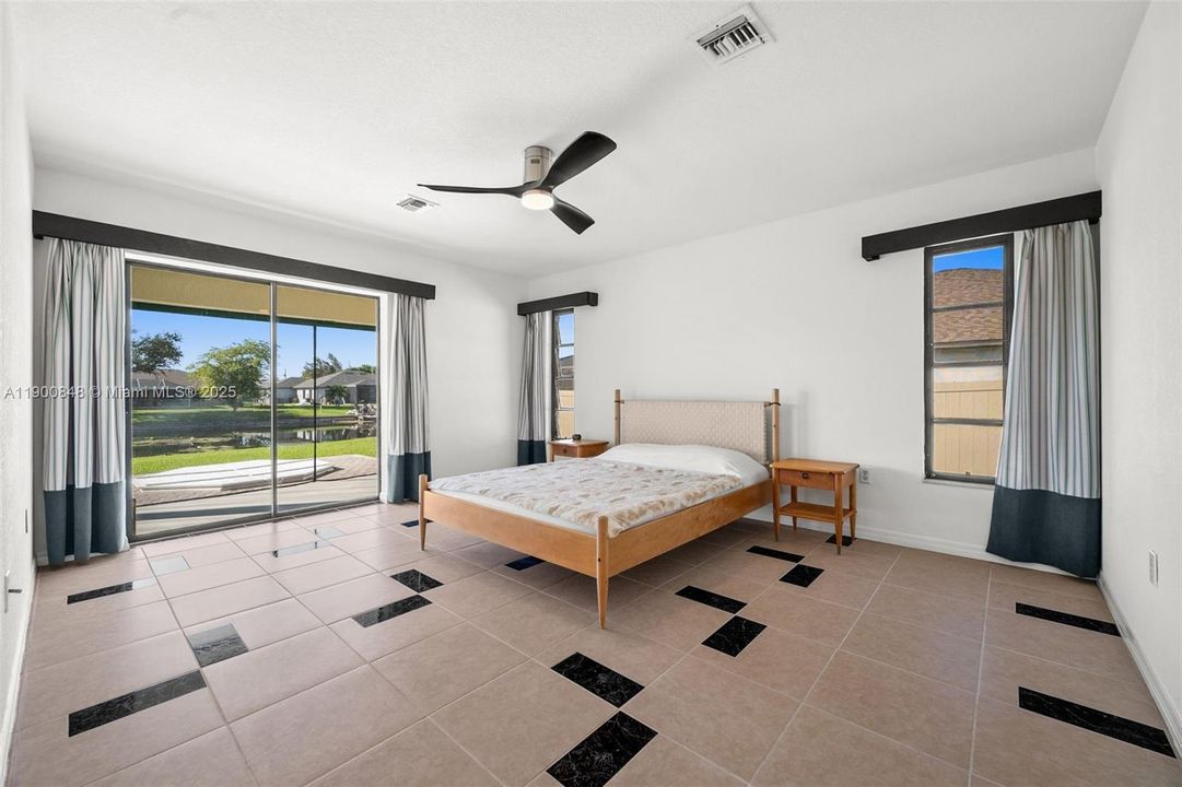 Master bedroom with sliding door to lanai