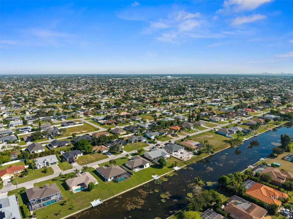 Aerial view of the back of the house, looking down the canal