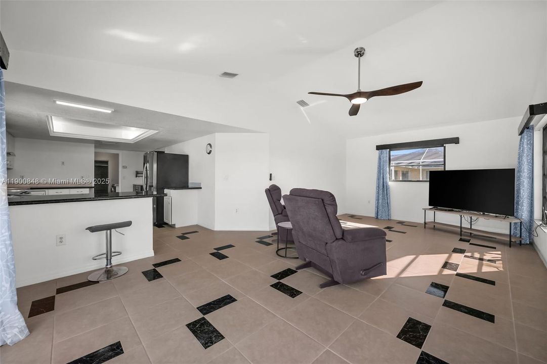 Family room adjacent to the kitchen and breakfast bar, great for gatherings